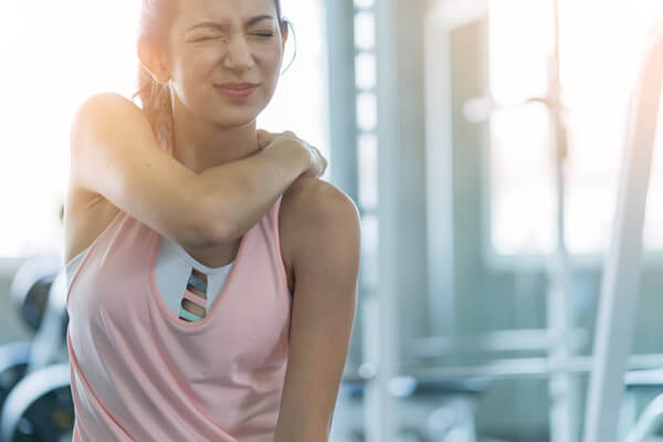 Woman suffering exercise pain